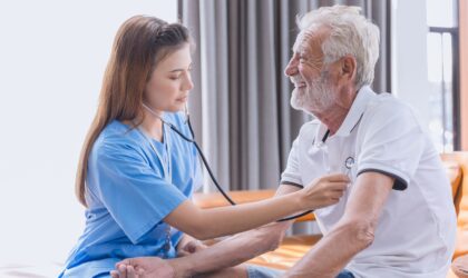 Nurse Medical Team Staff Working Support Service Health Care with Stethoscope Senior Elderly Man in Home Care.